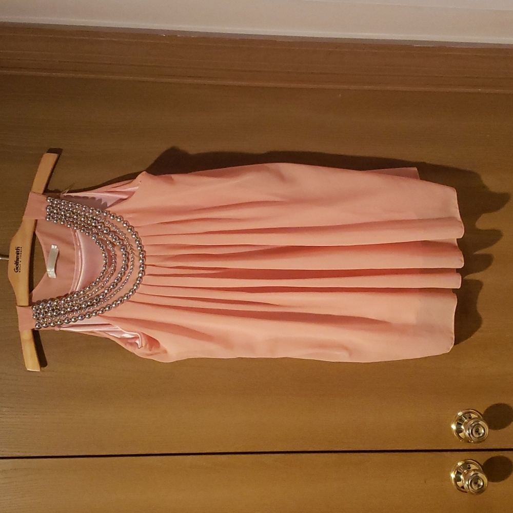Han Mei Yi L sleeveless top with silver pearl detail.